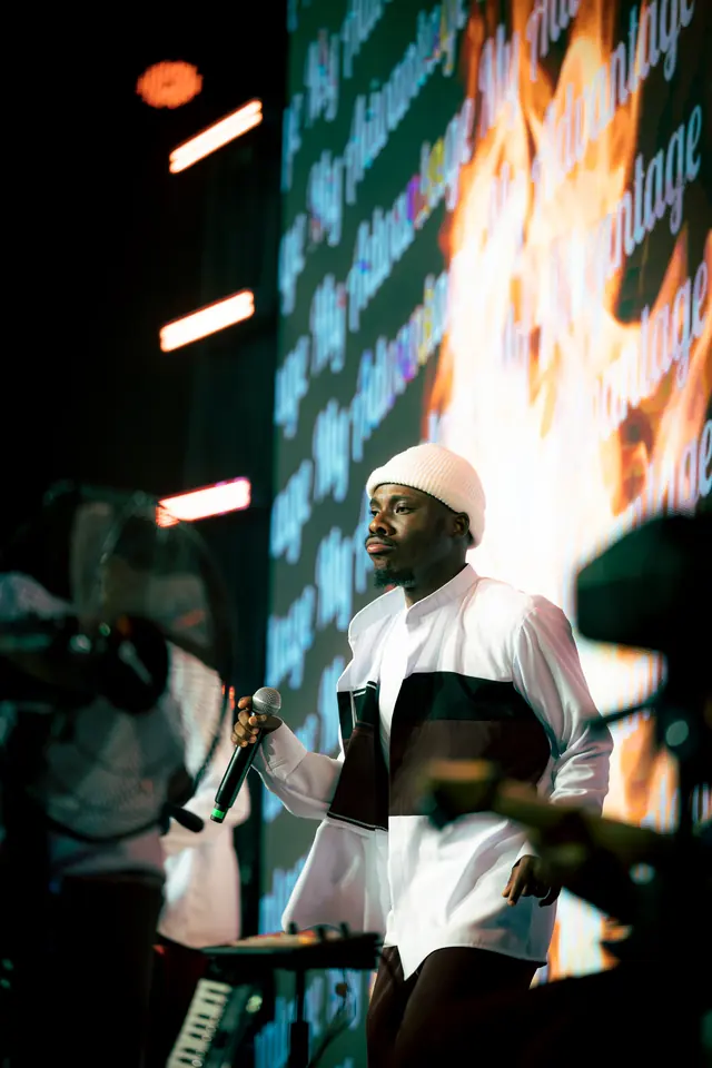 Paddy Daniel performing in front of an LED wall
